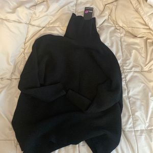 Black turtle neck sweater